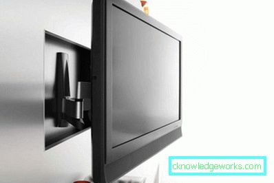 Дизайн стіни з телевізором у вітальні - фото ідей оформлення